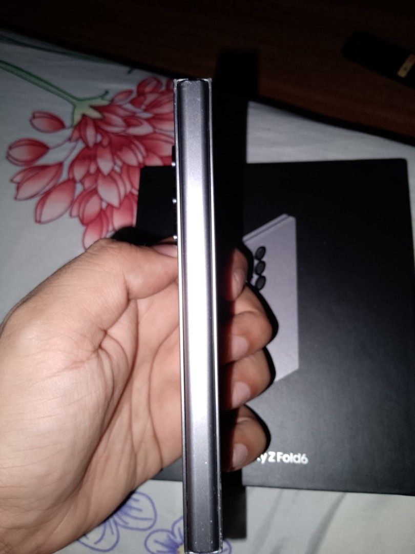 Samsung Zfold 6 512GB RUSH (Category: Samsung) located in Manila. Submitted by jgonzales236 (Listing ID 1470280478, Image 3). Description: Selling Zfold 6 512GB in Good condition With Box With Charger di mabilis malowbatt Minor scratches wala issue sa small screen and mainscreen. 10/10 overall performance pick up or meetup within Qc asking: 32,000php negotiable madali kausap.