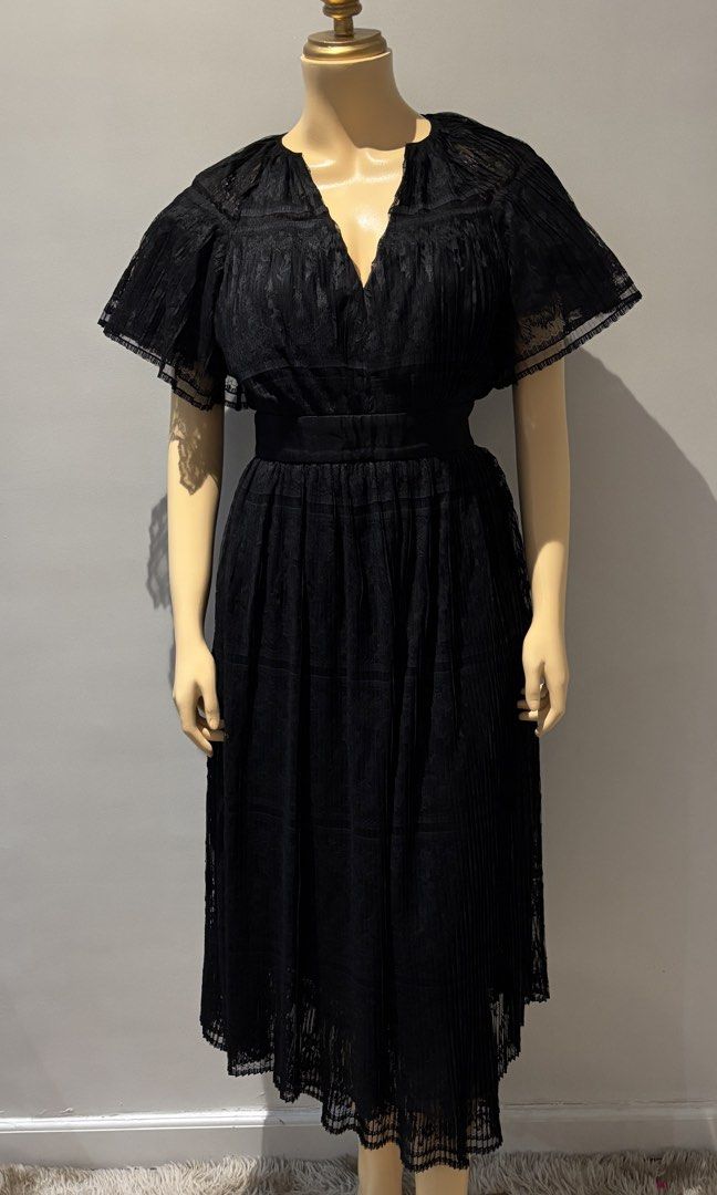 Sandro long pleated lace dress (Category: Dresses) located in Quezon City. Submitted by swift_kenjie (Listing ID 1470316671, Image 2). Description: 🖤 SANDRO PARIS | ELEGANT BLACK LACE DRESS 🖤 Quiet luxury at its finest! ✨ A stunning black lace dress featuring gorgeous flutter sleeves, delicate sheer details, and a flattering cinched waist. Timeless, feminine, and effortlessly sophisticated. Perfect for formal events, elegant dinners, parties, a