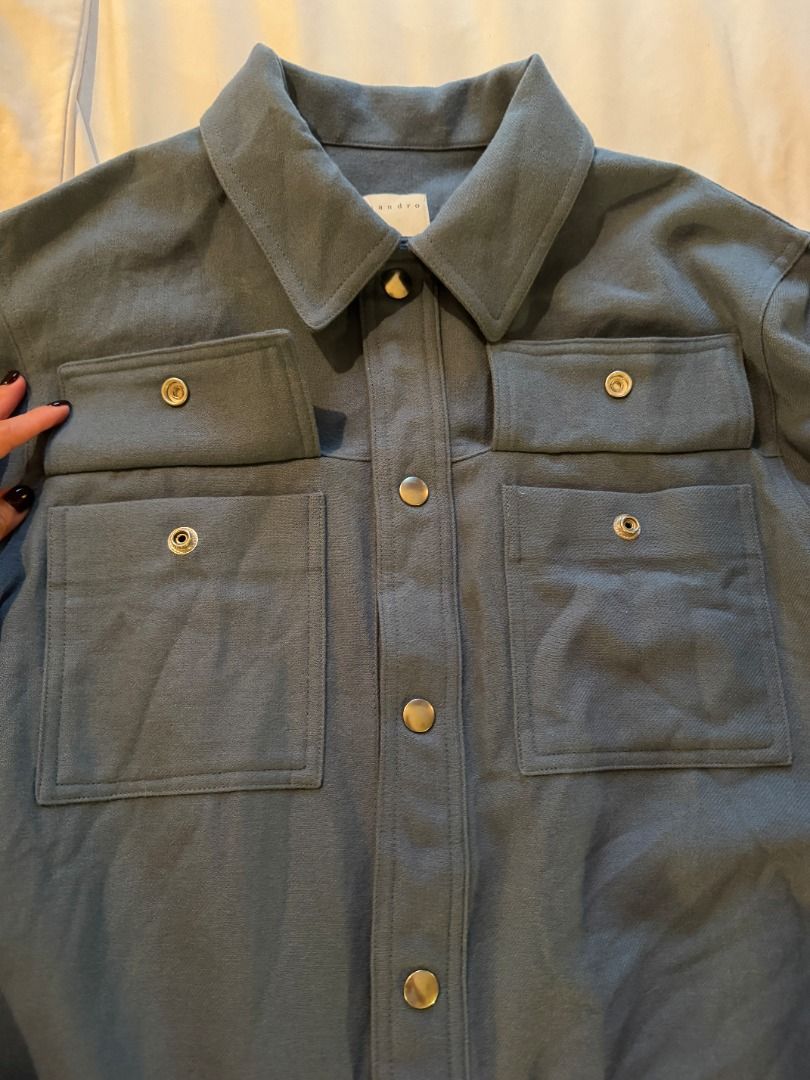 Sandro Paris Blue Overshirt Jacket Size S (Category: Coats, Jackets and Outerwear) located in Cebu City. Submitted by _t.rix (Listing ID 1470183381, Image 3). Description: - Brand: Sandro Paris - Size: Small - Color: Blue - Details: Classic collar, snap button front closure, dual chest flap pockets - Fabric: Sturdy structure with clean lines - Condition: Authentic branding and tags intact - Perfect for: Transitional weather layering.