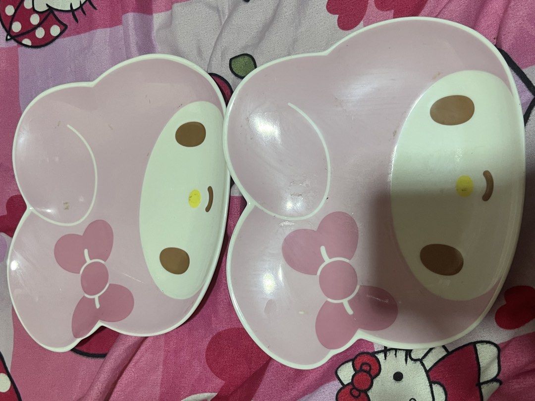 Sanrio My Melody melamine plates set (Category: Dinnerware & Cutlery) located in Manila. Submitted by janetecson05 (Listing ID 1470206030, Image 1). Description: - Set of 2 cute My Melody shaped plates - Features character face, ears, and pink bow design - Made of durable melamine material - Perfect for daily meals or snacks .