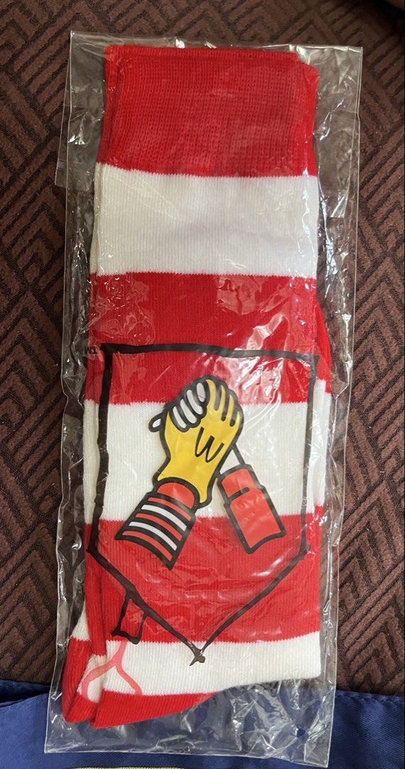 Scarf/socks (Category: Slippers & Slides) located in Bacoor. Submitted by ayit. (Listing ID 1470162876, Image 3). Description: - Includes 1 stylish blue and white square scarf featuring elegant chain, belt, and tassel designs - Includes 1 pair of eye-catching red and white striped socks with a playful handshake/glove graphic - Versatile fashion accessories to elevate your casual or statement outfits - Clean condition, well-kept, and ready for del