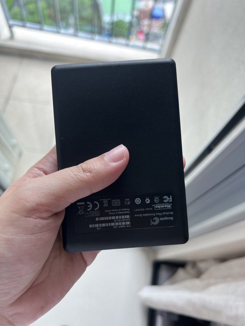 Seagate Backup Plus Portable Drive 1TB (Category: Hard Disks & Thumbdrives) located in Makati City. Submitted by jrj00 (Listing ID 1470189926, Image 3). Description: - Model: Seagate Backup Plus SRD00F1 - Storage Capacity: 1TB - Color: Black - Condition: Fully working and tested - Includes: Protective blue rubber sleeve and WD zipper pouch - Perfect for portable file storage and daily backups.