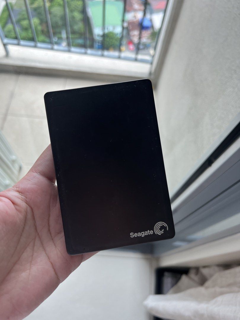 Seagate Backup Plus Portable Drive 1TB (Category: Hard Disks & Thumbdrives) located in Makati City. Submitted by jrj00 (Listing ID 1470189926, Image 1). Description: - Model: Seagate Backup Plus SRD00F1 - Storage Capacity: 1TB - Color: Black - Condition: Fully working and tested - Includes: Protective blue rubber sleeve and WD zipper pouch - Perfect for portable file storage and daily backups.