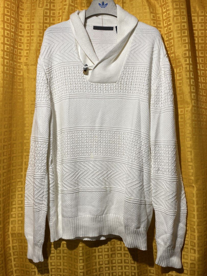 Sean John White Knit Shawl Collar Sweater (Category: Coats, Jackets and Outerwear) located in Caloocan City. Submitted by camarcenin42067 (Listing ID 1470281319, Image 1). Description: - Brand: Sean John - Color: White - Style: Shawl collar with attached hood and gold metal toggle button - Design: Textured chevron and geometric patterns on body and sleeves - Details: Chunky ribbed cuffs and hem - Material: Thick, warm knit fabric - Condition: Exc