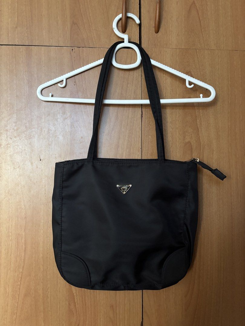Secosana Black Nylon Tote Bag (Category: Tote Bags) located in Cainta. Submitted by missirii (Listing ID 1470216838, Image 1). Description: - Brand: Secosana - Material: Durable black nylon with clean interior and exterior - Usage: Like new (used less than 20 times).