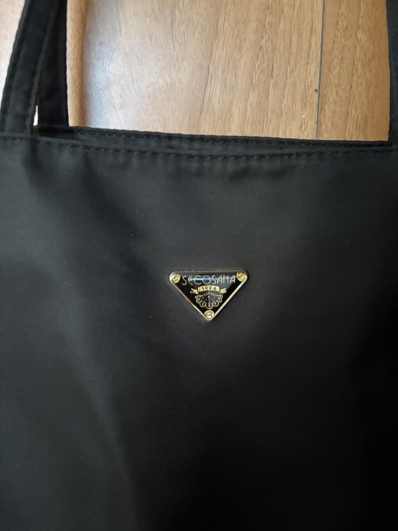 Secosana Black Nylon Tote Bag (Category: Tote Bags) located in Cainta. Submitted by missirii (Listing ID 1470216838, Image 3). Description: - Brand: Secosana - Material: Durable black nylon with clean interior and exterior - Usage: Like new (used less than 20 times).