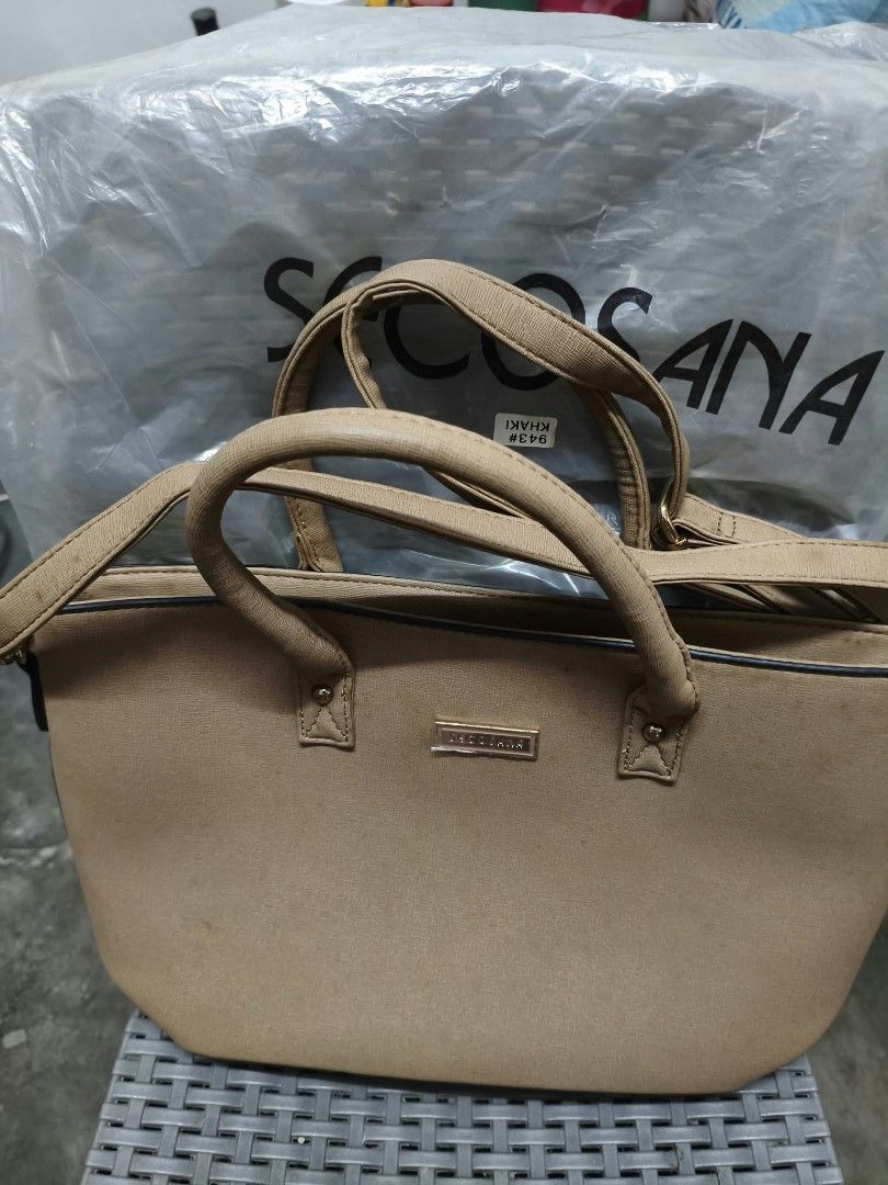 Secosana Khaki Handbag with Tag (Category: Luxury Bags & Wallets) located in Manila. Submitted by marielcari00032 (Listing ID 1470200338, Image 1). Description: - Brand: Secosana - Color: Khaki - Material: Premium faux leather - Condition: Brand new with store tag attached, never used, and clean interior - Design: Structured shape with sleek metal branding plate - Carry options: Dual top handles and a detachable shoulder strap - Storage: Exterior