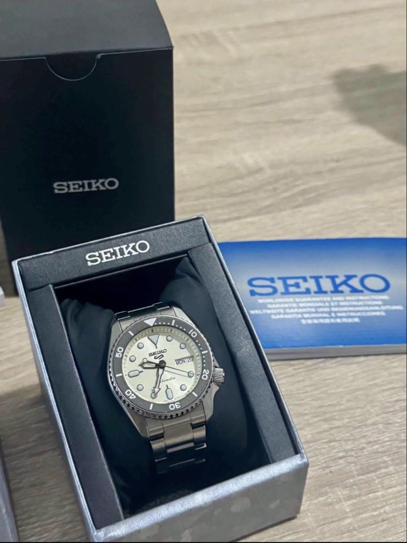 Seiko 5 Sports Cream Dial (Category: Luxury Watches) located in Muntinlupa City. Submitted by el1b12345 (Listing ID 1470238917, Image 3). Description: Seiko 5 Sports SRPK31K1 Size: 38mm Caliber Number: 4R36 Movement Type: Automatic Case Material: Stainless steel Thickness: 12.1 mm Diameter: 38 mm Lug-to-lug: 44.2 mm Water Resistance: 10 bar - Bought from @Tokyo Eastwood - Complete links with box and certificate of guarantee - Used 3x only - No is