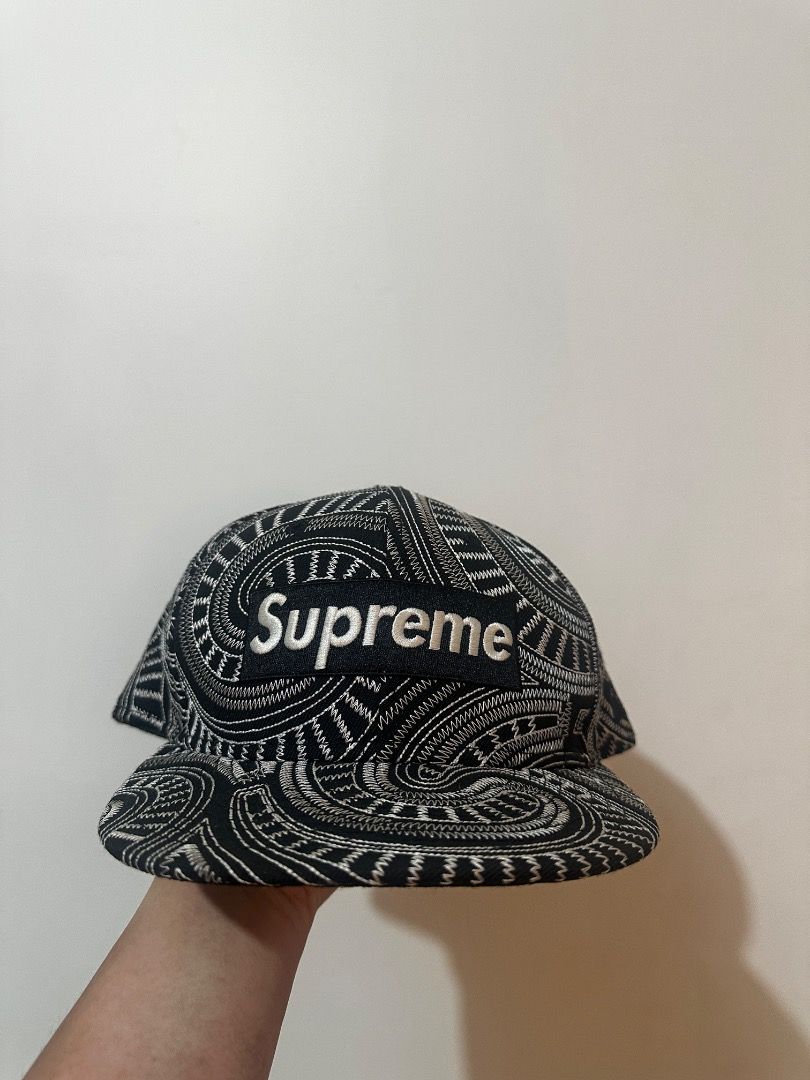 Supreme x New Era Uptown Box cap (Category: Caps & Hats) located in Manila. Submitted by abpangilin77577 (Listing ID 1470263511, Image 1). Description: - Brand: Supreme x New Era - Style: Fitted cap - Size: 7 5/8 - Color/Design: Black and white patterned with intricate stitching all over - Logo: Iconic embroidered box logo on the front - Condition: lighlty used, but stored in the cabinet for a long time. NOTE: This was a gift to me by my cousin b