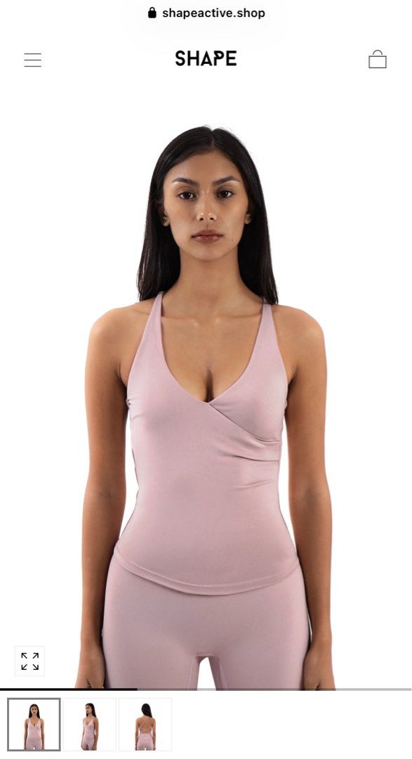 Shape Active Tone Cross Back Tank Top in Rose (Category: Sleeveless) located in Quezon City. Submitted by bananabreadbaby (Listing ID 1470200049, Image 1). Description: Brand new. Only wore to try. - Original price: 1,850. - Brand/Style: Shape Active Tone Cross Back Tank Top - Color: Rose - Design: V-neck wrap front with multi-strap crisscross back and lower back branding - Material: Soft and stretchy fabric - Versatility: Great for workouts, gym