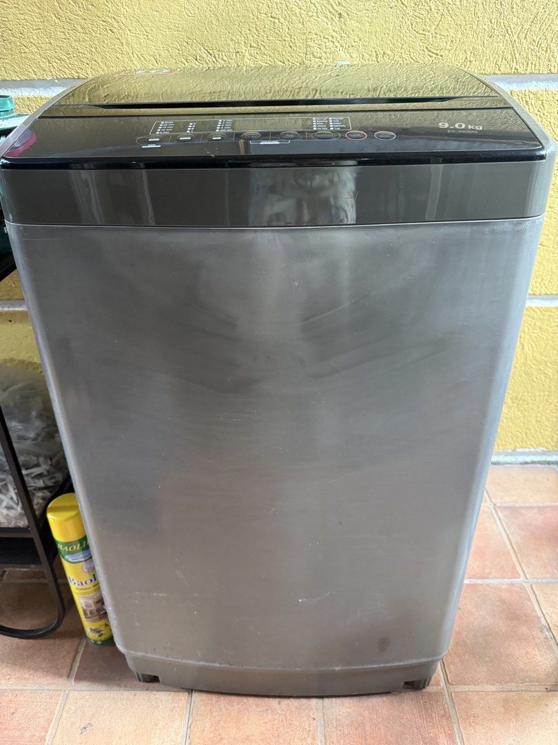 Sharp ES-JN09A9 9.0kg Top Load Washing Machine (Category: Washing Machines and Dryers) located in Quezon City. Submitted by sbcarrot (Listing ID 1470278838, Image 1). Description: - Brand/Model: Sharp 9.0kg Top Load Washing Machine - Color: Dark grey body with premium black glass lid - Control Panel: User-friendly digital display with multiple wash programs, water levels, and preset timers - Warranty: Includes 10-year motor warranty badge - Condi