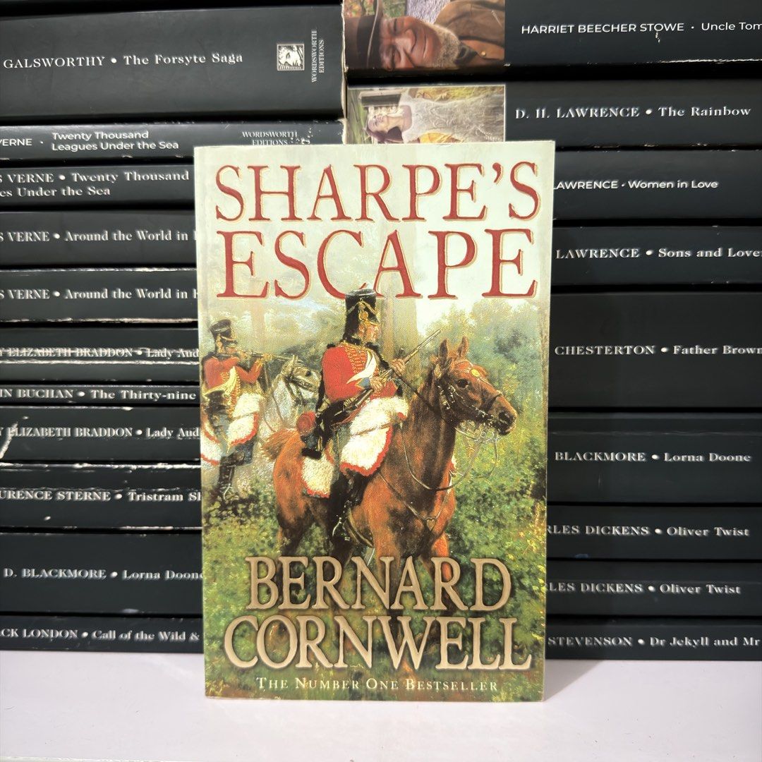 Sharpe's Escape by Bernard Cornwell Paperback Novel (Category: Storybooks) located in Lingayen. Submitted by readwjane (Listing ID 1470200075, Image 1). Description: - Title: Sharpe's Escape by Bernard Cornwell - Format: Paperback edition - Condition: Standard reading copy with clear text - Cover: Vibrant military illustration - Perfect for: Historical adventure fans and book collectors - Availability: Limited stock, grab it before someone else d