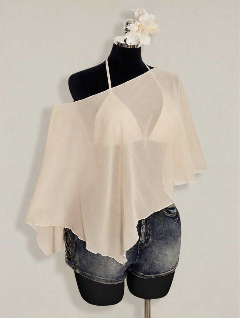 Sheer Cream Asymmetrical One-Shoulder Poncho Top (Category: Blouses) located in Quezon City. Submitted by srhmppyy (Listing ID 1470280735, Image 1). Description: Never worn, just washed Inner not included.