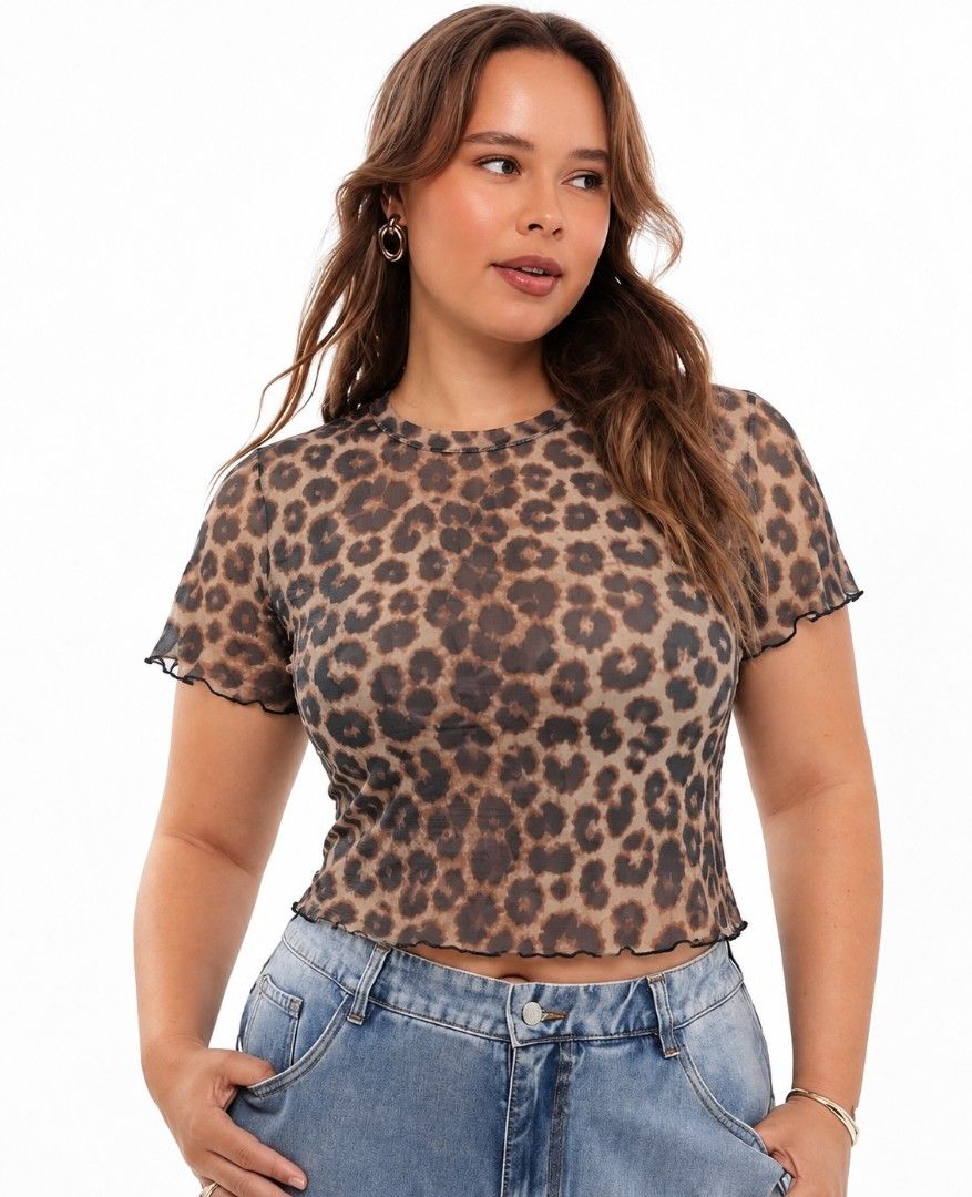 SHEIN Curve Leopard Print Mesh Tee Size 0XL (Category: Sleeveless) located in Manila. Submitted by babeboxtheory (Listing ID 1470295902, Image 1). Description: - Brand/Style: SHEIN Curve leopard print mesh top - Size: 0XL (tag attached) - Design: Short sleeves, round neckline, and trendy lettuce trim edges - Fabric: Sheer animal print mesh (94% polyester, 6% elastane) - Features: Lightweight, stretchy, and makes a great layering piece - Care: Han