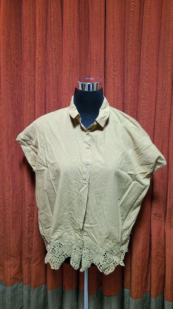 Short Sleeve Button Down Blouse with Crochet Lace Hem (Category: Blouses) located in Caloocan City. Submitted by mocs.stash (Listing ID 1470180570, Image 2). Description: Short Sleeve Button Down Blouse with Crochet Lace Hem Selling for ₱100 Condition: Preloved in great condition Price: ₱100 Shipping & Location Details: Location: Caloocan Shipping Fee: Paid by buyer Couriers: Grab Express, Lalamove, GoGo Xpress (GGX), or LBC Send a direct message