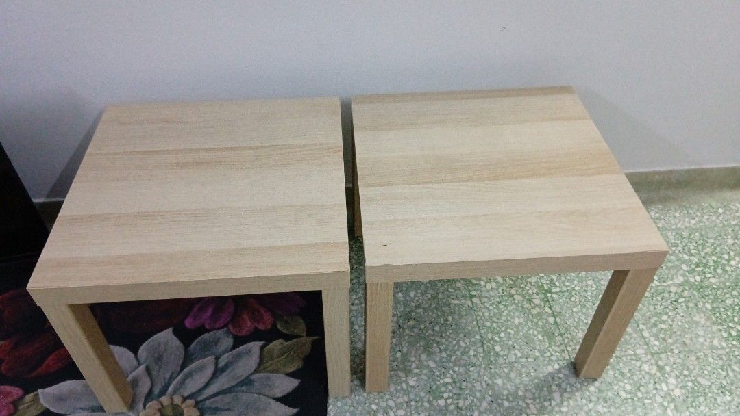 Side Table (Category: Tables & Sets) located in Kuala Lumpur. Submitted by jadeites (Listing ID 1470290928, Image 1). Description: Brand: IKEA - Side Table Size: 55cm x 55cm x 45cm (h) Price: RM 90 for a pair - Clean, minimalist square wooden tops with sturdy legs - Versatile design that matches most home decors - Ideal as bedside tables or living room sofa side tables - Flexible purchase: buy together as a pair or separately - Condition: Like ne