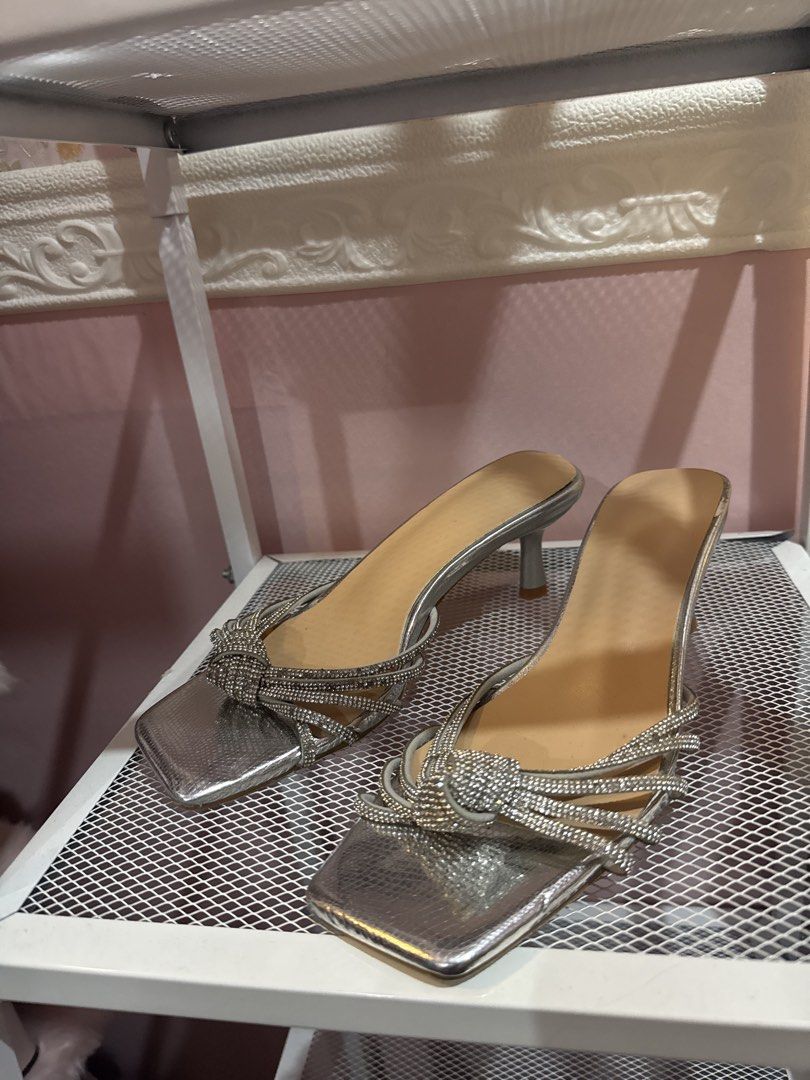 Silver Rhinestone Strappy Kitten Heels Size 35 (Category: Heels) located in Bacoor. Submitted by micsr (Listing ID 1470286902, Image 2). Description: For size 34-35 and slim feet medyo masikip na sa 36 - Style: Silver kitten heels with sparkly rhinestone front straps - Toe Shape: Trendy square toe - Comfort: Easy-to-walk-in heel height with nude insoles - Size: 35 (marked on sole).