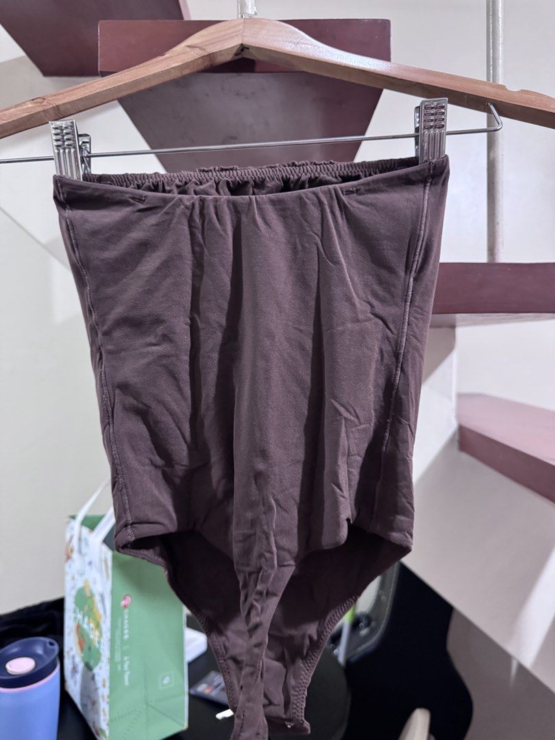 SKIMS tight bodysuit (Category: Sleeveless) located in Quezon City. Submitted by peanutsquash (Listing ID 1470221762, Image 1). Description: - strapless bodysuit, never used - bought in US (forgot hm but it was around 1.5k in php) - ORIGINAL skims, selling low! Negotiable hehe just msg mee.