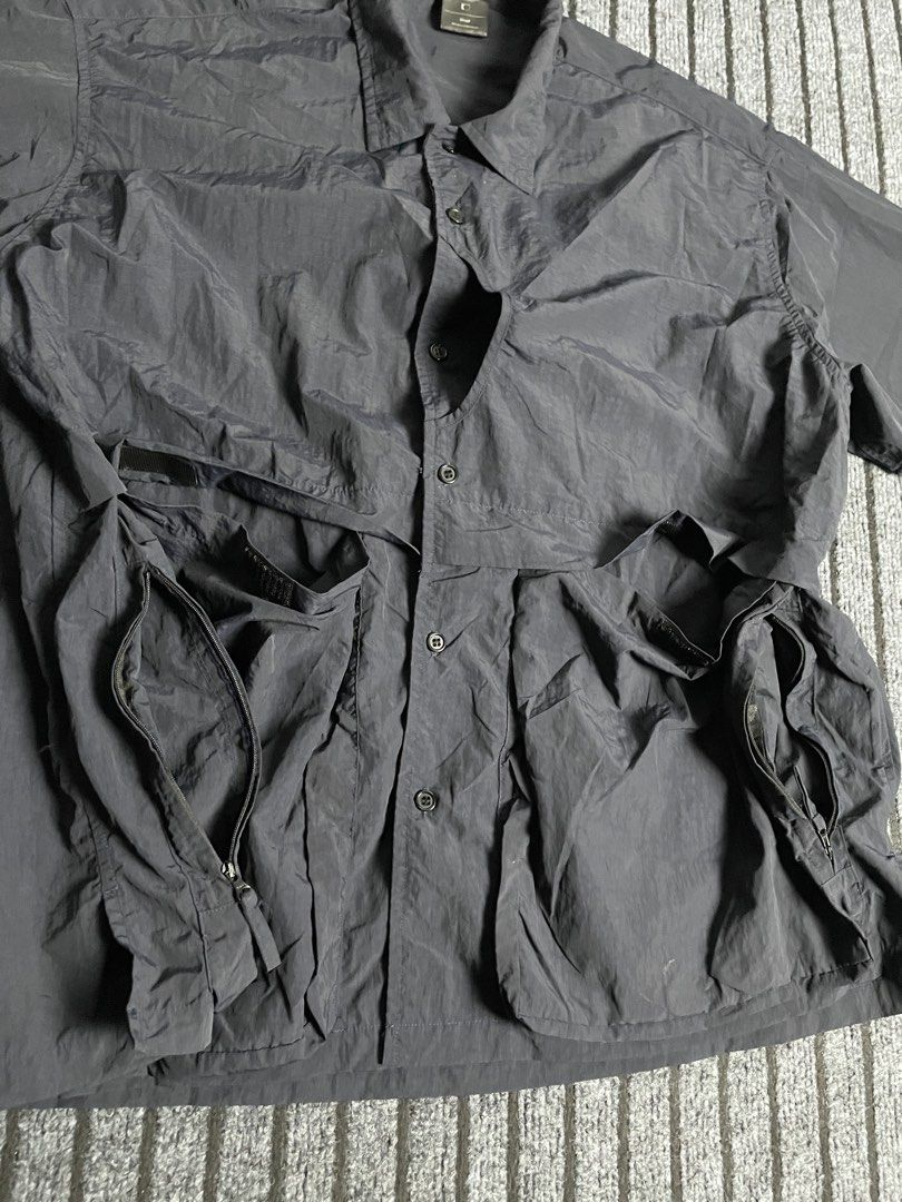 SMKL - Multipocket/Utilitt Nylon Polo in Navy (Category: Activewear) located in Puerto Princesa. Submitted by palawan.swagdealer (Listing ID 1470324257, Image 3). Description: All details are provided Kindly check each photo No major flaws In excellent condition Total pockets: 5.