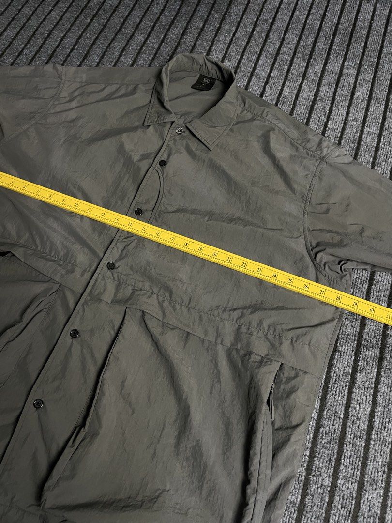 SMKL - Multipocket/Utility Nylon Polo in Grey (Category: Activewear) located in Puerto Princesa. Submitted by palawan.swagdealer (Listing ID 1470323941, Image 3). Description: All details are provided Kindly check each photo Have some unnoticable stain In very good condition Total pockets: .