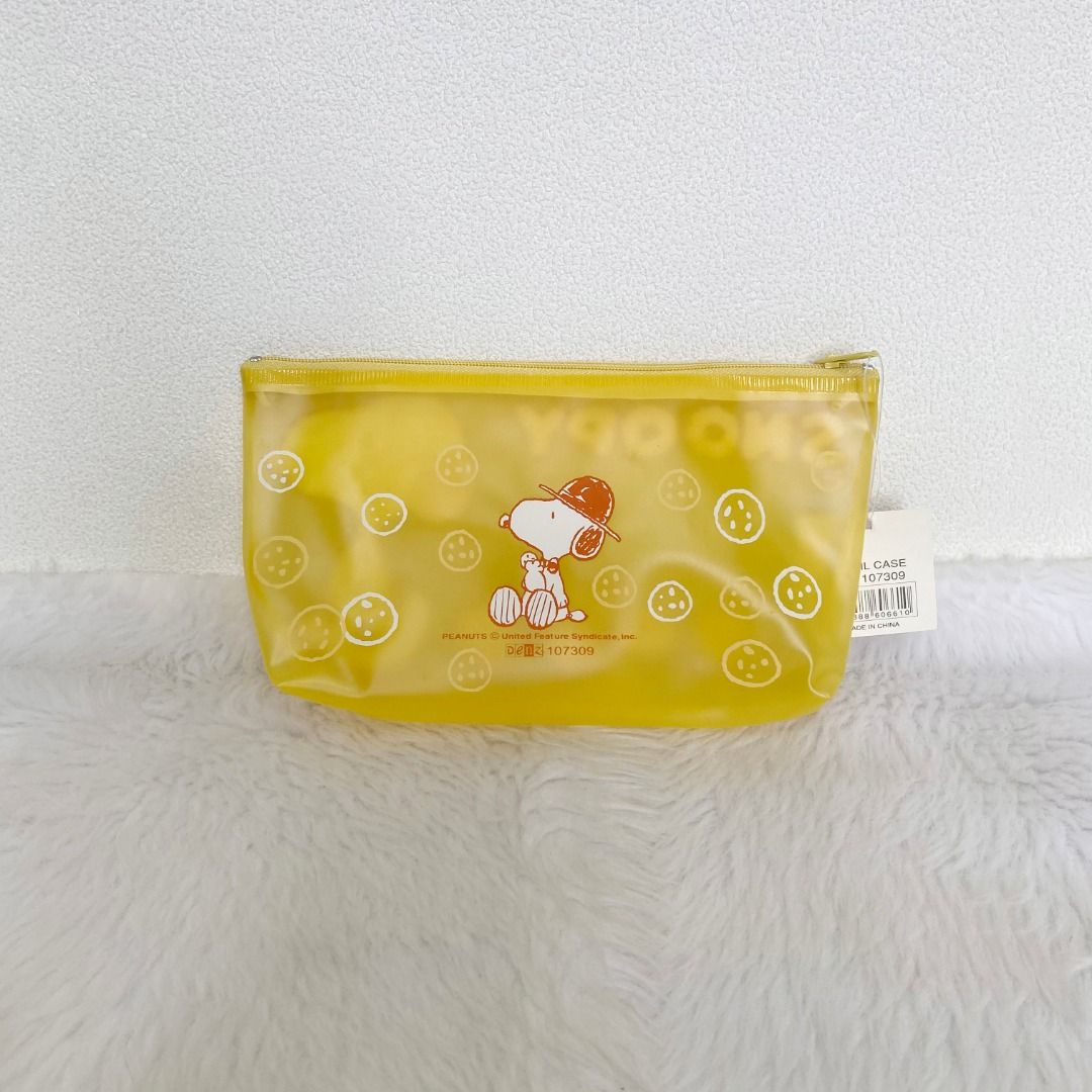 Snoopy Peanuts Yellow Nylon Zip Pouch (Category: Purses & Pouches) located in Cebu City. Submitted by posh_avenue888 (Listing ID 1470194776, Image 2). Description: Brand new. From Japan. 100% authentic!!! 8" x 4" x 1.5"..