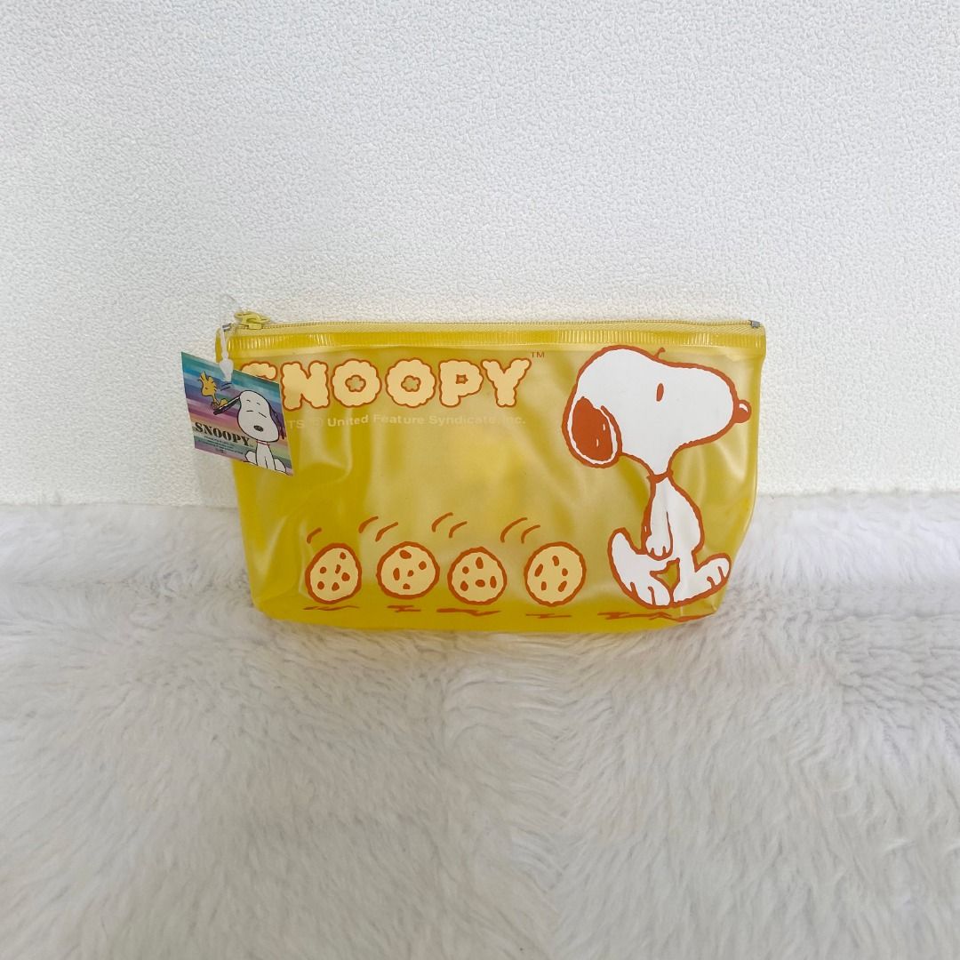 Snoopy Peanuts Yellow Nylon Zip Pouch (Category: Purses & Pouches) located in Cebu City. Submitted by posh_avenue888 (Listing ID 1470194776, Image 1). Description: Brand new. From Japan. 100% authentic!!! 8" x 4" x 1.5"..