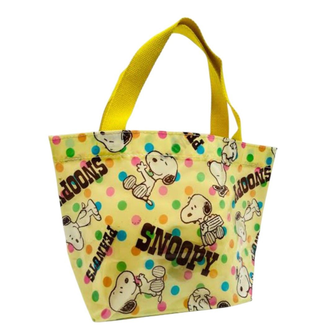 🇯🇵Snoopy Peanuts Yellow Polka Dot Tote Bag (Category: Tote Bags) located in Mangaldan. Submitted by closetqwin (Listing ID 1470202579, Image 1). Description: - Authentic Snoopy and Peanuts design - Cheerful yellow with colorful polka dots - Water-resistant shiny material - Gusseted sides for extra storage capacity - Durable bright yellow fabric handles - Perfect compact lunch bag or casual everyday tote.