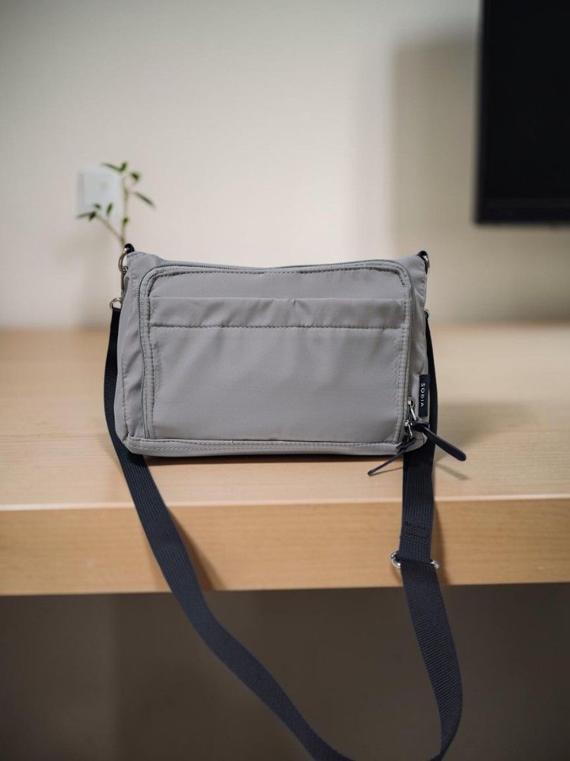SOBIA MULTIPOCKET NYLON SLING (Category: Cross-body Bags) located in Las Pinas. Submitted by annachiaonair2037 (Listing ID 1470292860, Image 2). Description: SOBIA MULTIPOCKET NYLON SLING FROM JAPAN UNISEX LIGHT WEIGHT, PERFECT FOR TRAVEL ADJUSTABLE DETACHABLE STRAP H 7" L 10" W 2.5" Disclaimer: I am not affiliated with, associated with, or authorized by any of the brands featured posted. Any mention of brand names, trademarks, or logos is solely