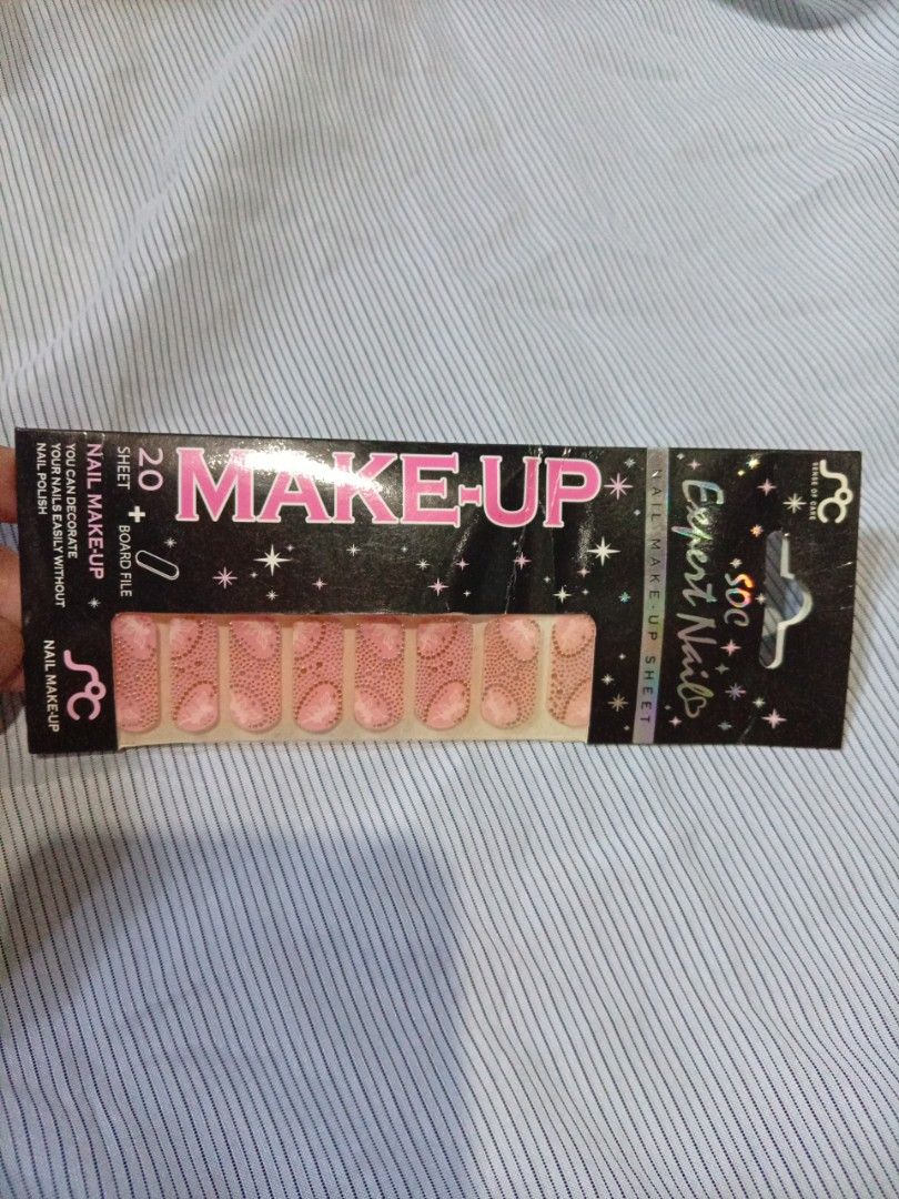 Freebie - SOC Expert Nails Make-Up Sheet 20 Nails Board File (Category: Hands & Nails) located in Manila. Submitted by tinygazo90639 (Listing ID 1470220173, Image 1). Description: - Brand: SOC Expert Nails - Condition: Brand new, unopened, and totally unused - Includes: 20 pink patterned nail wraps and a board file - Features: Quick and easy nail decoration without liquid polish - Perfect for: Fast and convenient DIY manicures at home.