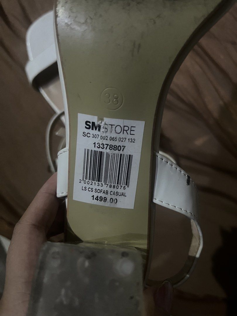 Sofab White Strappy Block Heels 🤍 Size 38 (Category: Heels) located in Manila. Submitted by abbyyel (Listing ID 1470270215, Image 3). Description: - Brand: Sofab - Style: White strappy heels with trendy clear block heels and square toe - Closure: Ankle strap with buckle - Size: 38 - Condition: Lightly Used - Price Tag: Original SM Store tag attached (₱1,499) Manila/Pasig.