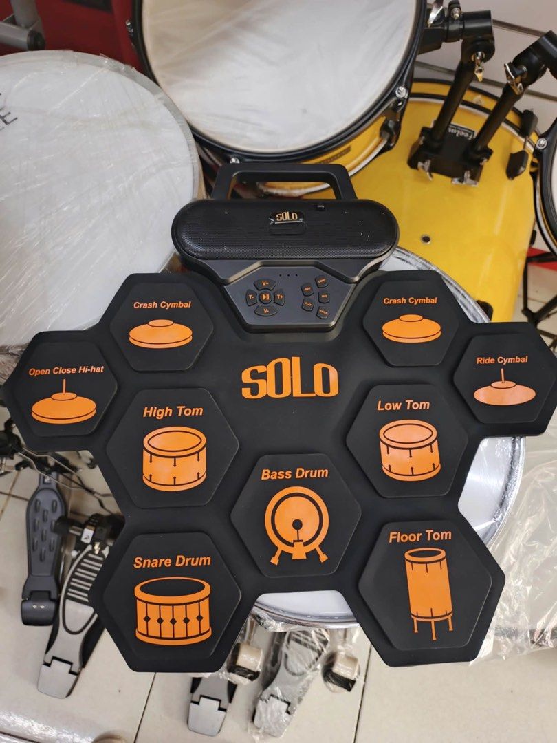SOLO Portable Electronic Drum Pad Set (Category: Musical Instruments) located in Las Pinas. Submitted by andreadomingo2518 (Listing ID 1470176624, Image 1). Description: - SOLO electronic roll-up drum pad kit with built-in speaker - Full layout: snare, high tom, low tom, floor tom, crash, ride, open/close -hat, and bass drum - Integrated top control panel for volume, playback, recording, and styles - Great portable practice tool for drummers - Ea