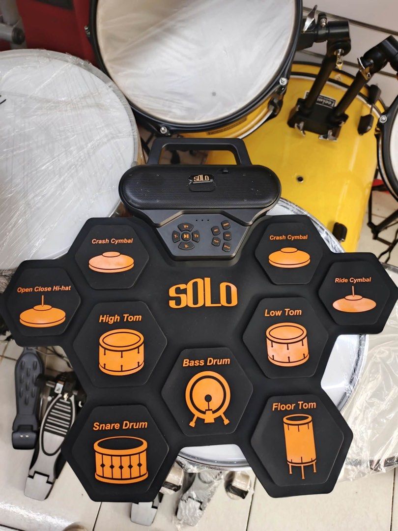SOLO Portable Electronic Drum Pad Set (Category: Musical Instruments) located in Las Pinas. Submitted by andreadomingo2518 (Listing ID 1470176624, Image 2). Description: - SOLO electronic roll-up drum pad kit with built-in speaker - Full layout: snare, high tom, low tom, floor tom, crash, ride, open/close -hat, and bass drum - Integrated top control panel for volume, playback, recording, and styles - Great portable practice tool for drummers - Ea