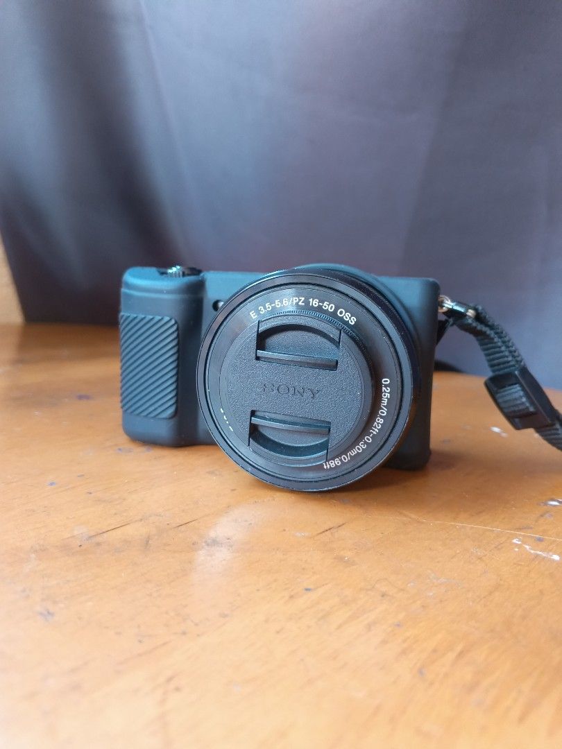 Sony A5100 Mirrorless Camera for photography and vlogging (Category: Cameras) located in San Pedro. Submitted by encrisph (Listing ID 1470208462, Image 3). Description: 24mp Soft Skin Effect Built-in Flash working Fast autofocus Tilting LCD screen for selfies Wifi connect for easy transfer to phone Mirrorless Compact Great for traveling, content creating, photography, and vlogging Inclusions: Box Camera sling bag 1 battery Charger 64gb Sandisk Ca