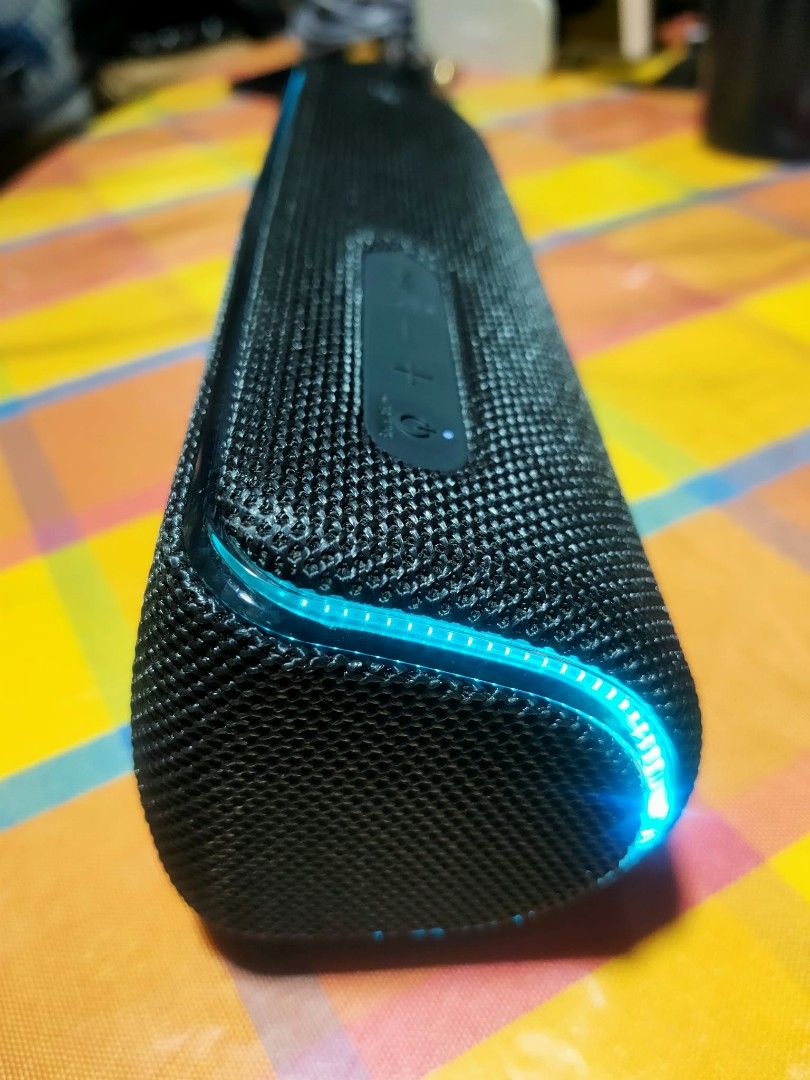 Sony SRS-XB31 Portable Wireless Bluetooth Speaker (Category: Soundbars, Speakers & Amplifiers) located in Manila. Submitted by jhs31 (Listing ID 1470308358, Image 2). Description: - Authentic Sony SRS-XB31 wireless speaker in sleek black - Built-in LED light strip with vibrant teal and blue glow - Durable mesh fabric exterior body - Secure rubber flap covering ports (micro-USB charging, audio-in, USB DC out) - Convenient top buttons for power, vo