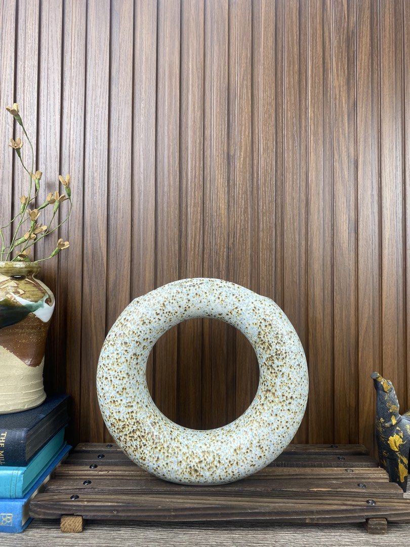 Speckled Donut Vase (Category: Vases & Decorative Bowls) located in Pasay City. Submitted by thepickypicker (Listing ID 1470180397, Image 1). Description: Speckled Donut P980 Size: 8" tall, 8 3/8 wide .