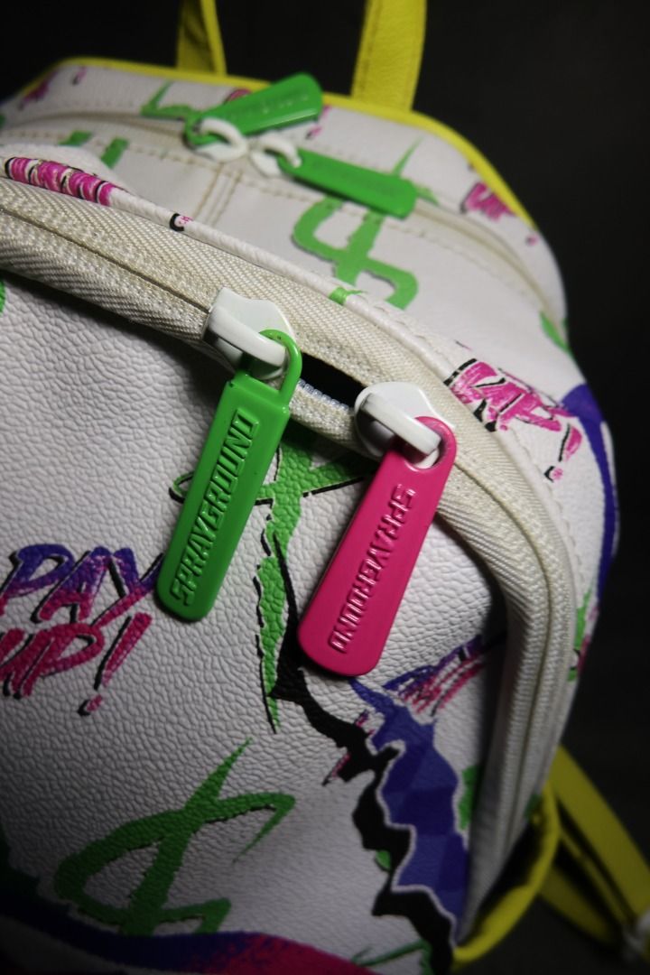 Sprayground Dreamy Technicolor Savage Backpack (Category: Backpacks) located in Victoria. Submitted by manoguidma85750 (Listing ID 1470172532, Image 2). Description: Authentic Sprayground Dreamy Technicolor Savage Mini Backpack.