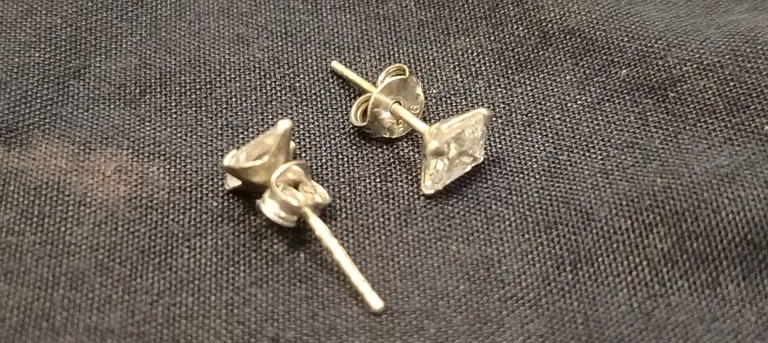 Square Diamond Stud Earrings Silver Post Backings (Category: Earrings) located in Caloocan City. Submitted by mysticrabbit_c00da6 (Listing ID 1470234549, Image 2). Description: Classic square stone stud earrings with a diamond-like sparkle. Features secure silver posts and butterfly backings. Simple, versatile everyday jewelry that matches any outfit..