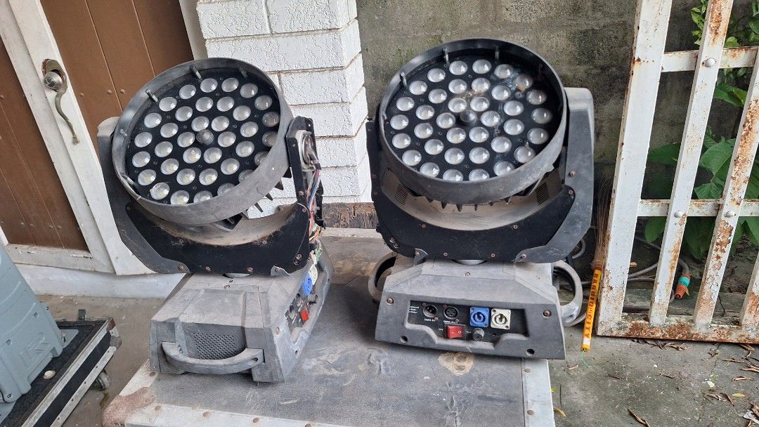 Stage LED Moving Head Lights with Flight Case (Category: Lighting & Studio Equipment) located in Angeles City. Submitted by pamdiel003 (Listing ID 1470241390, Image 2). Description: - Dual moving head LED stage lights mounted in a heavy-duty flight case - Multi-lens array on each unit for dynamic stage lighting effects - Equipped with standard PowerCon inputs and DMX in/out ports - Powers up successfully using standard connectors - Condition note