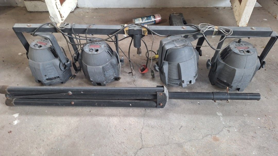 Stage lighting system with 4 lights and tripod stand (Category: Lighting) located in Angeles City. Submitted by pamdiel003 (Listing ID 1470231833, Image 3). Description: - Complete stage lighting setup ready for your next gig or party - Includes mounting bar, 4 spotlights with power cables, and connectors - Heavy-duty folding tripod stand included - Pre-wired and ready to hook up - Condition: Shows slight dust and cosmetic wear from previous use 