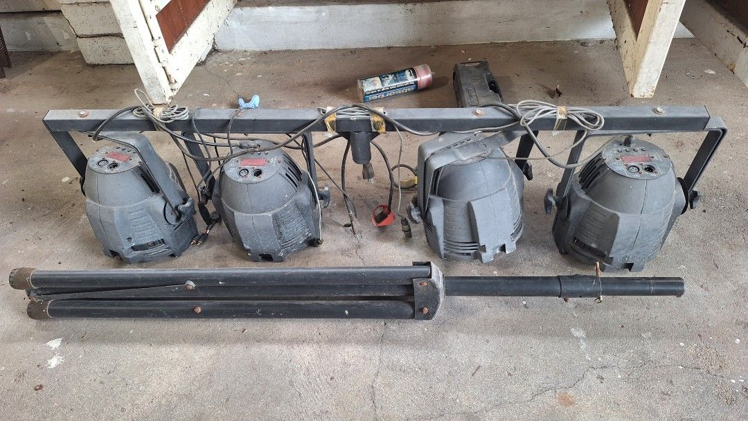Stage lighting system with 4 lights and tripod stand (Category: Lighting) located in Angeles City. Submitted by pamdiel003 (Listing ID 1470231833, Image 2). Description: - Complete stage lighting setup ready for your next gig or party - Includes mounting bar, 4 spotlights with power cables, and connectors - Heavy-duty folding tripod stand included - Pre-wired and ready to hook up - Condition: Shows slight dust and cosmetic wear from previous use 