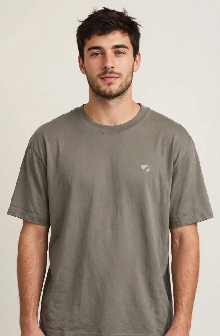 Starter Moss Short Sleeve Drifit T-Shirt (Category: Tshirts & Polo Shirts ) located in San Pedro. Submitted by lifebeginsaftercoff33 (Listing ID 1470219988, Image 1). Description: - Brand: Starter - Color: Moss - Fit: Relaxed fit with classic crew neckline - Details: Small logo printed on the chest - Material: Soft athletic fabric - Best for: Workouts or casual daily wear - Condition: Clean and ready to wear - Dimes: 21 x 27 in.