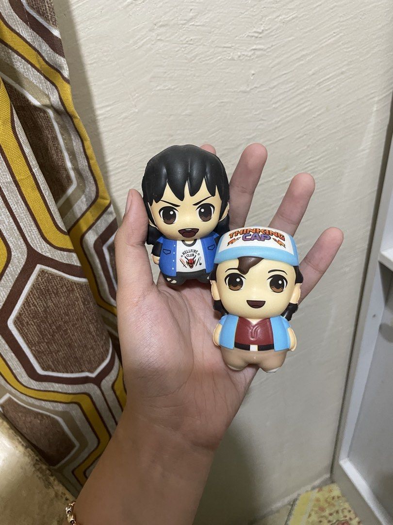 Stranger Things Eddie Munson and Dustin Henderson Figures (Category: Figurines & Statues) located in Sindangan. Submitted by squishyyyxoxo (Listing ID 1470150182, Image 1). Description: - Bundle of 2 Stranger Things soft squishy figures - Includes Eddie in his Hellfire Club shirt and denim vest - Includes Dustin in his Thinking Cap hat and blue vest - Great display pieces for fans of the show - Selling both together as a set.