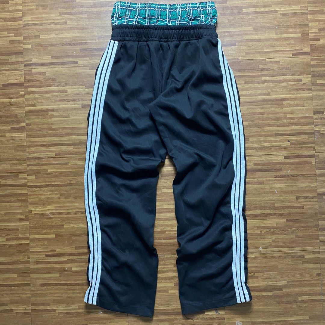 Streetwear double layered sweatpants (Category: Joggers) located in Quezon City. Submitted by semantaryrave (Listing ID 1470298474, Image 2). Description: Streetwear double layered sweatpants Openwaist- 26 to 32 Waist- 26 Length- 41 Thigh- 11 Hem- 9 Dm purchase .