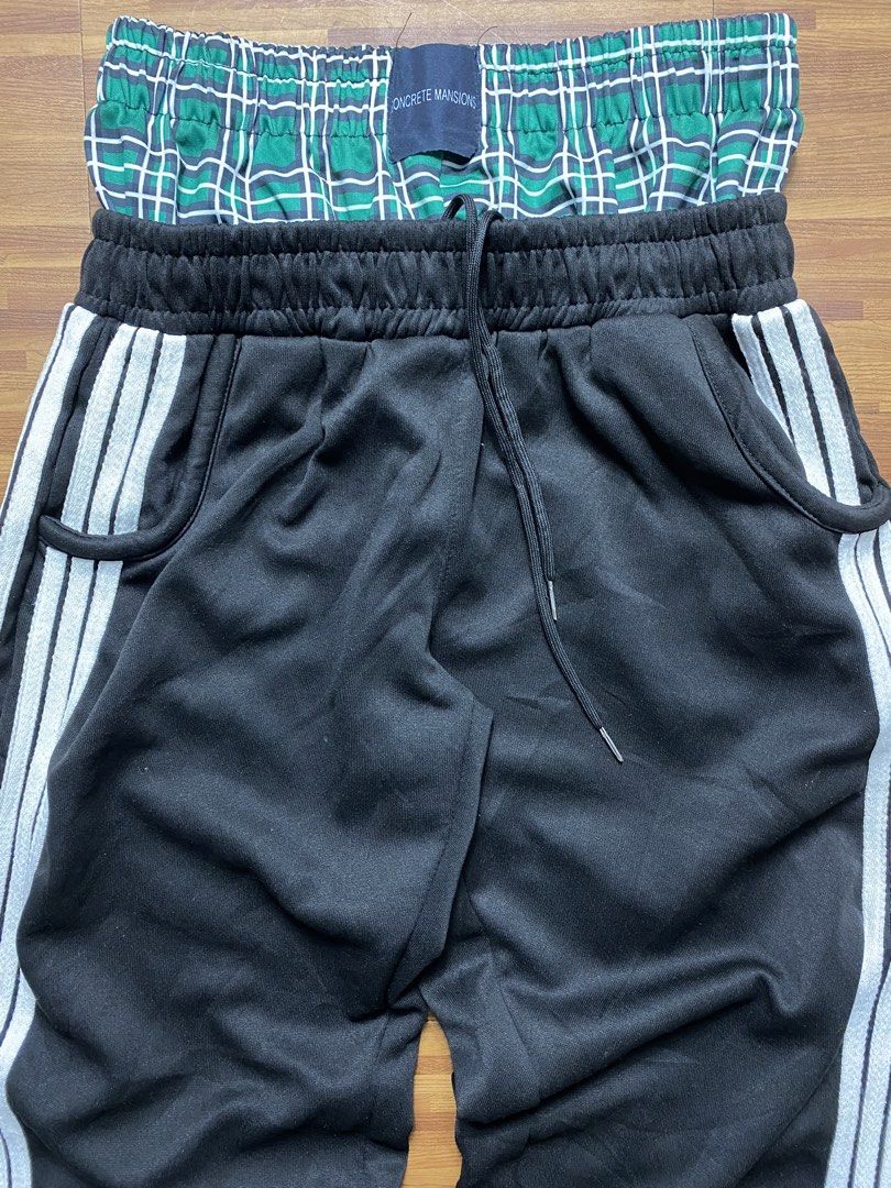 Streetwear double layered sweatpants (Category: Joggers) located in Quezon City. Submitted by semantaryrave (Listing ID 1470298474, Image 3). Description: Streetwear double layered sweatpants Openwaist- 26 to 32 Waist- 26 Length- 41 Thigh- 11 Hem- 9 Dm purchase .
