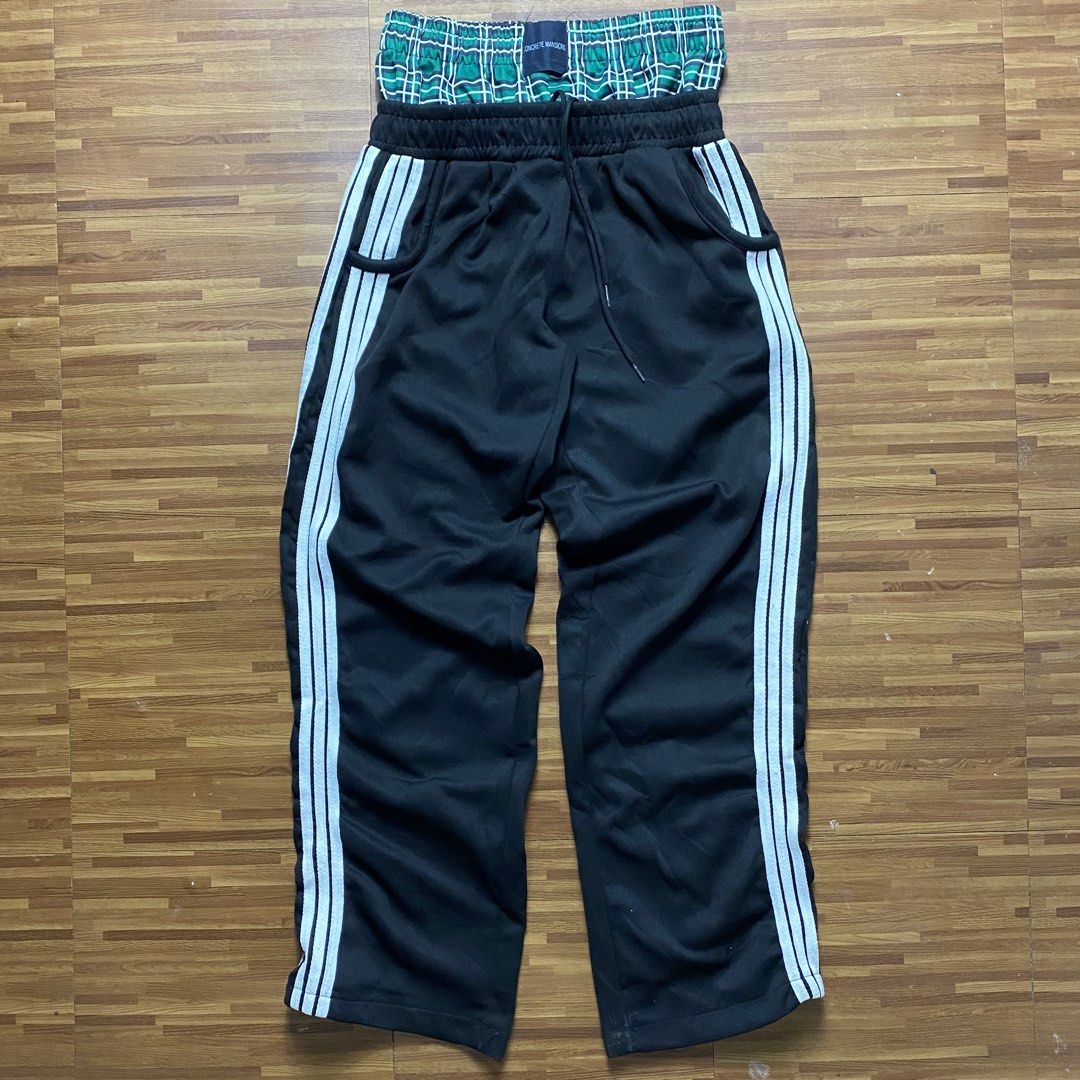 Streetwear double layered sweatpants (Category: Joggers) located in Quezon City. Submitted by semantaryrave (Listing ID 1470298474, Image 1). Description: Streetwear double layered sweatpants Openwaist- 26 to 32 Waist- 26 Length- 41 Thigh- 11 Hem- 9 Dm purchase .