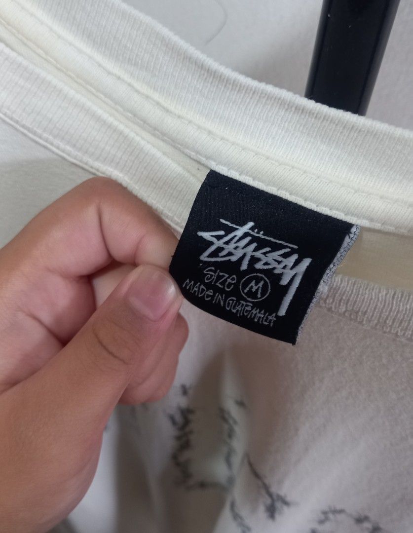 Stussy Ant Graphic White Tee Size M (Category: Tshirts & Polo Shirts ) located in Tarlac. Submitted by den420 (Listing ID 1470220192, Image 3). Description: - Brand: Stussy - Style: Crewneck t-shirt with short sleeves and standard fit - Color: White - Size: M (tag attached) - Material: 100% cotton, made in Guatemala - Design: Unique ant graphic spelling the Stussy logo on the front and a swirl design on the back - Condition: Like new with tags.