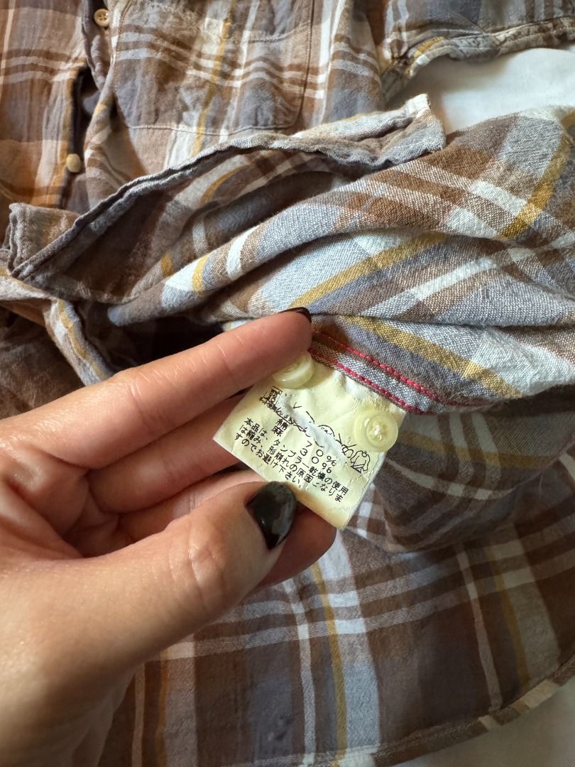 Sugar Cane Light Plaid Button Down Shirt Size L (Category: Tshirts & Polo Shirts ) located in Cebu City. Submitted by _t.rix (Listing ID 1470168669, Image 3). Description: - Brand: Sugar Cane Light - Style: Short-sleeve button-down shirt - Pattern: Brown, grey, and white plaid with yellow accent stripes - Features: Button-down collar, single chest pocket, curved hem - Size: L - Condition: Excellent, well-maintained - Mode of Payment: GCash - Ship
