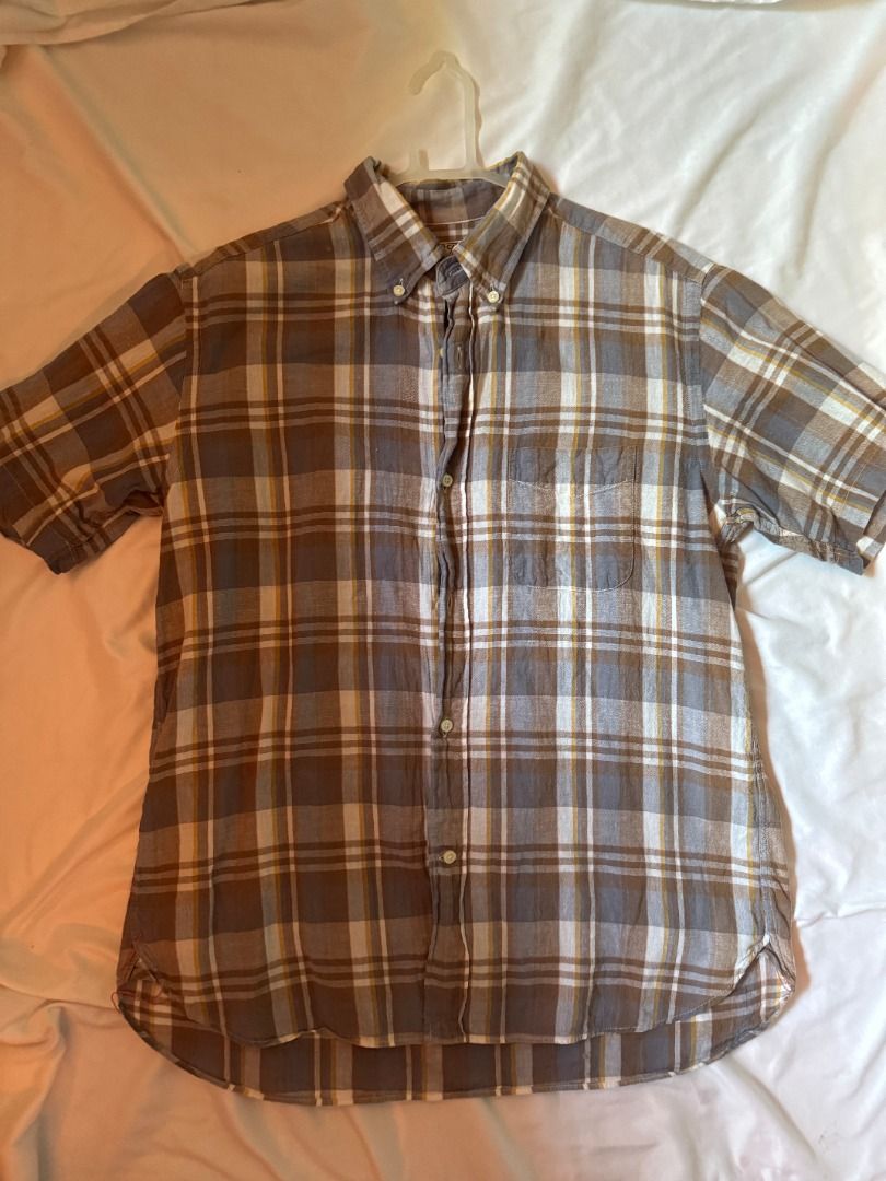 Sugar Cane Light Plaid Button Down Shirt Size L (Category: Tshirts & Polo Shirts ) located in Cebu City. Submitted by _t.rix (Listing ID 1470168669, Image 1). Description: - Brand: Sugar Cane Light - Style: Short-sleeve button-down shirt - Pattern: Brown, grey, and white plaid with yellow accent stripes - Features: Button-down collar, single chest pocket, curved hem - Size: L - Condition: Excellent, well-maintained - Mode of Payment: GCash - Ship