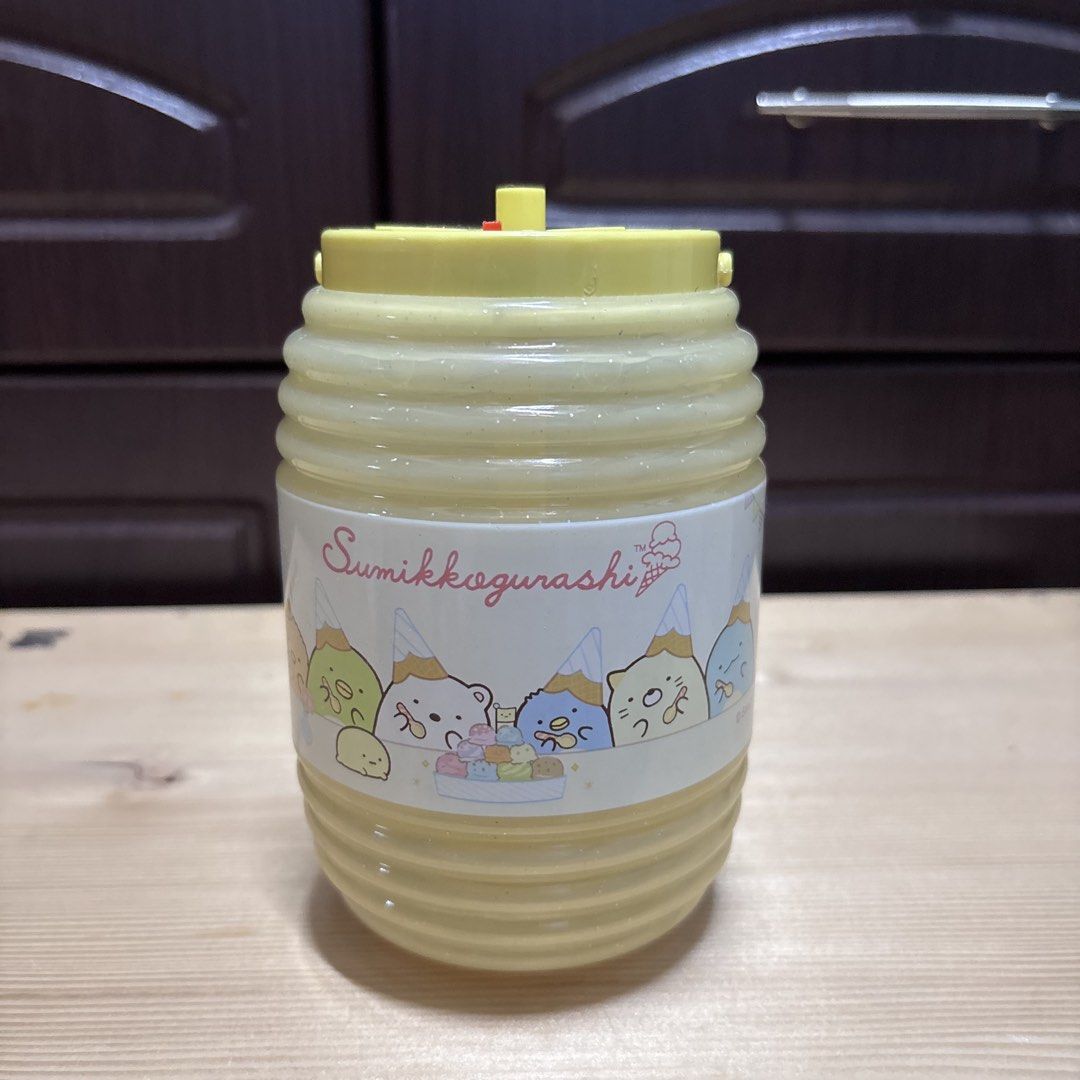 Sumikkogurashi Projector Light Yellow Honey Jar Design (Category: Lighting) located in Manila. Submitted by nero.ph (Listing ID 1470348376, Image 1). Description: - Authentic San-X Sumikkogurashi yellow honey jar projector - Adorable design featuring characters wearing ice cream cone hats - Easy-to-use switch on top to activate projection - Projects cute character graphics onto walls or surfaces - Made of clean, yellow translucent plastic - Perfe