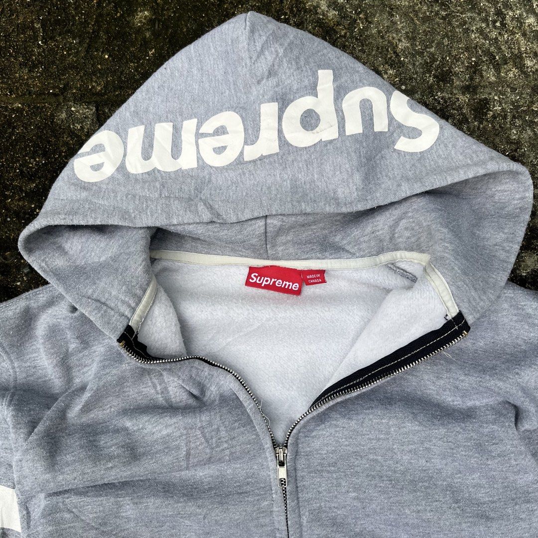 Supreme Script Zip-up hoodie (Category: Coats, Jackets and Outerwear) located in Iloilo. Submitted by singkomils.ilo5000 (Listing ID 1470230454, Image 2). Description: Supreme Script Zip up hoodie Size Large Excellent condition No flaws Iloilo City.